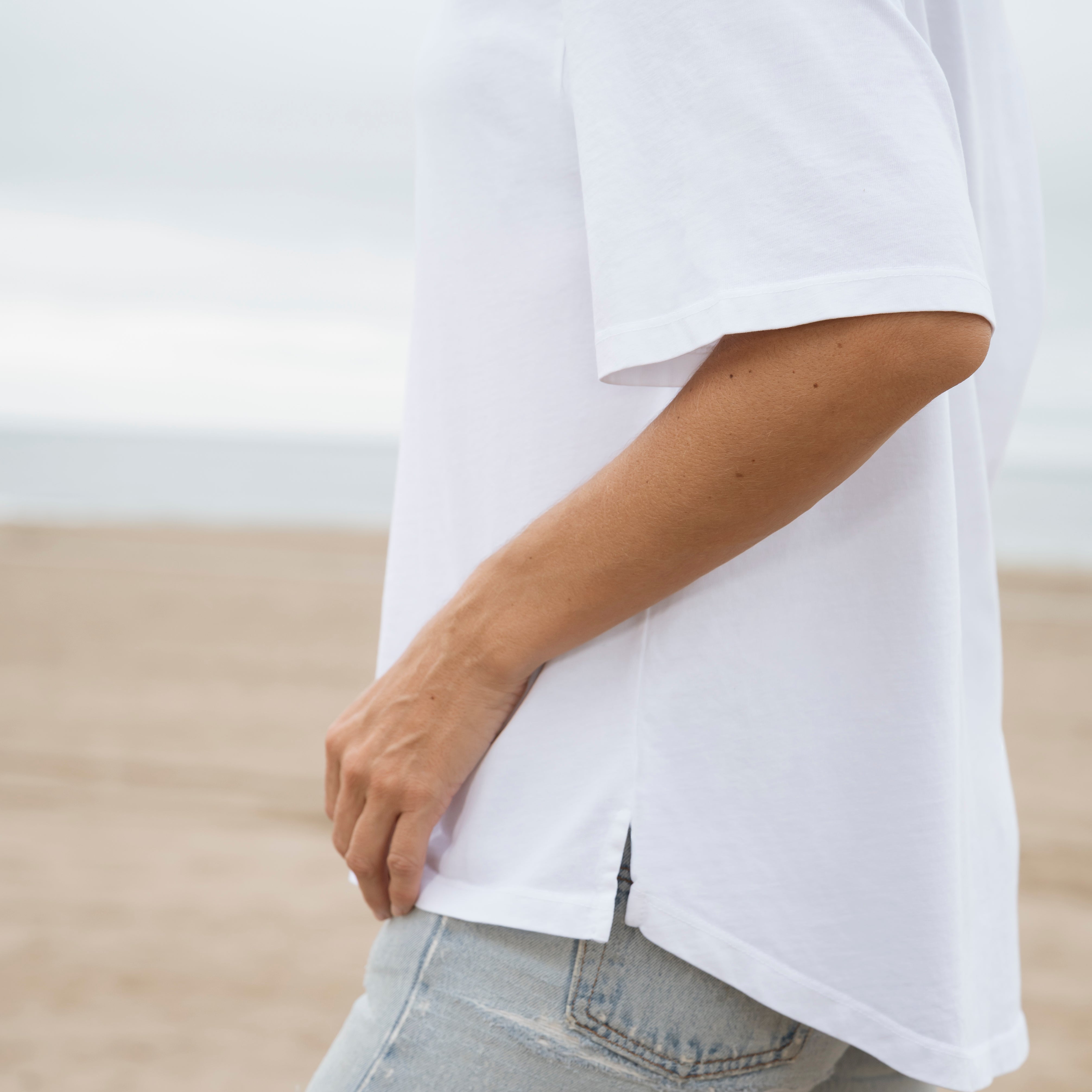 #color_white Womens Over Shoulder Curved Elbow Heavyweight Tee Side