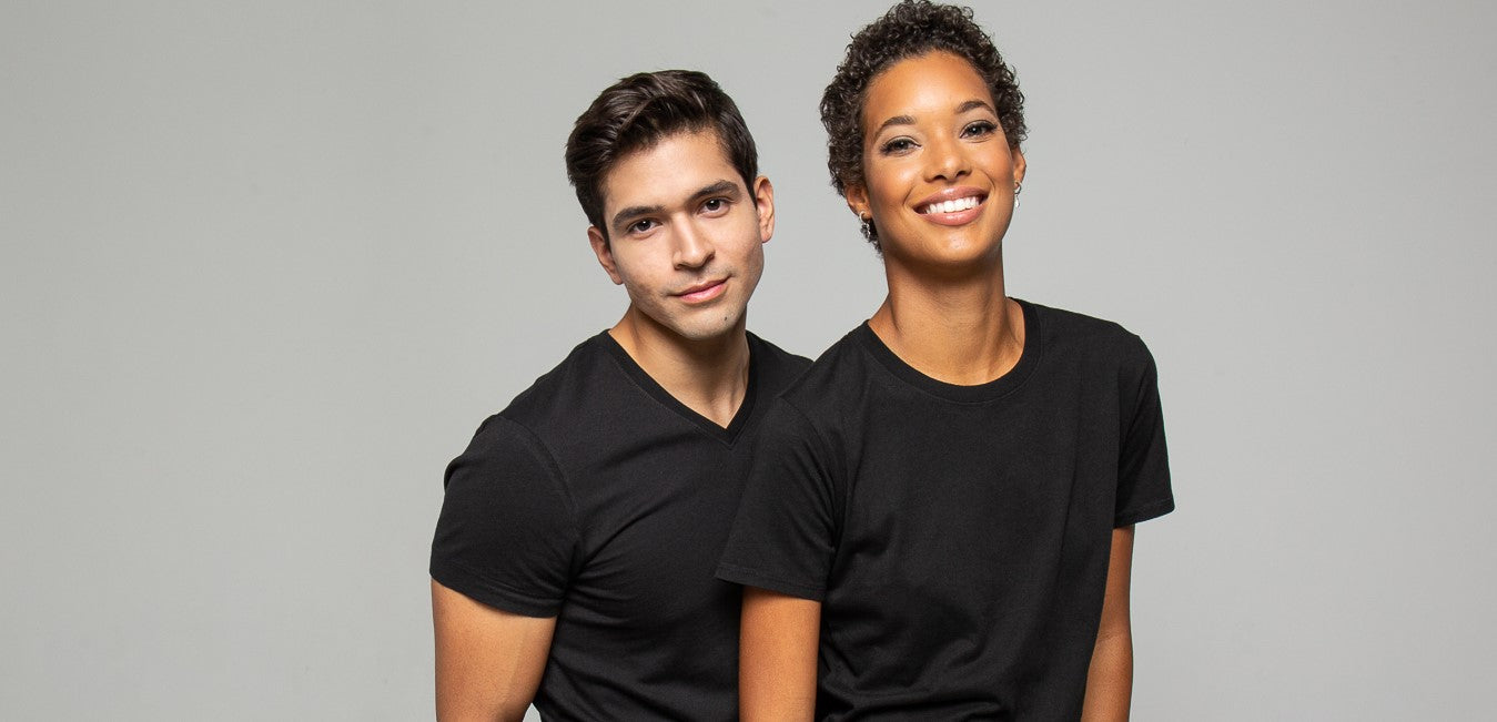 man and woman wearing premium t shirts