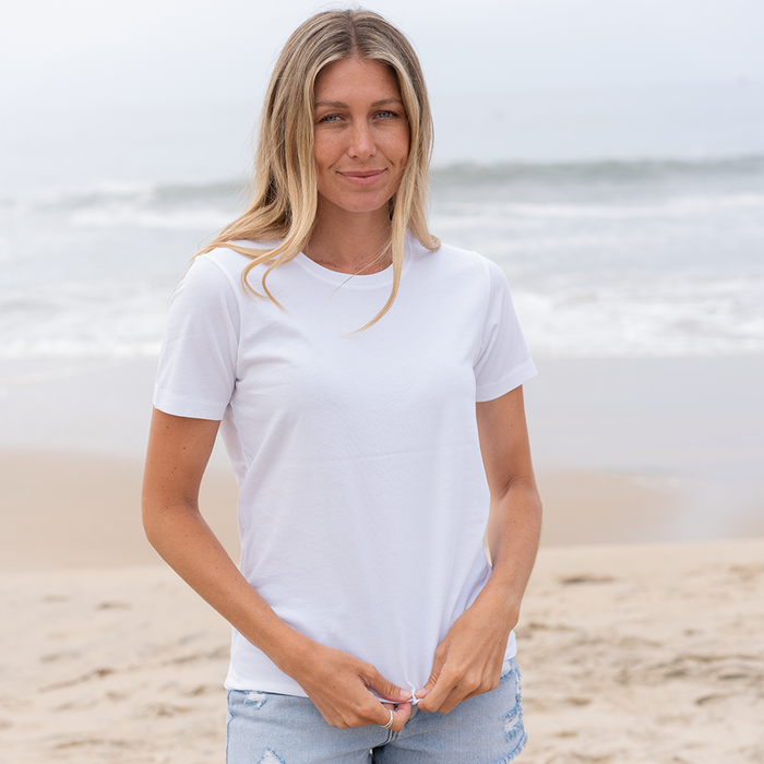 A woman wearing a white T-Shirt